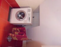 wall, home appliance, red, indoor, washing machine, floor, sink, appliance, clothes dryer, bathroom, laundry, major appliance